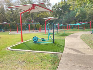 Dot Thomas Park showing shade over fitness station.