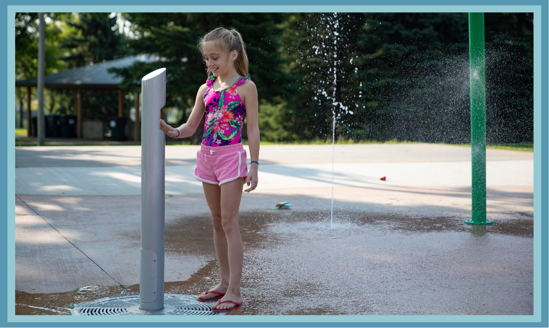 Aquatix HydroLogix® activation bollard and water-distribution manifold for a non-electrical domestic splash pad system.