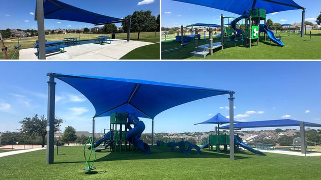 Completed playground at Queen Margaret Park in Castle Hills featuring a Landscape Structures PlayBooster® main structure, shade structures, and We-Go-Swing® inclusive swing set.