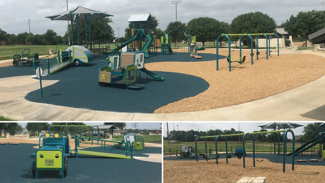 PlayOdyssey Treehouse main structure with interconnected slides, climbers, and decks at Warren Sports Complex in Frisco, Texas