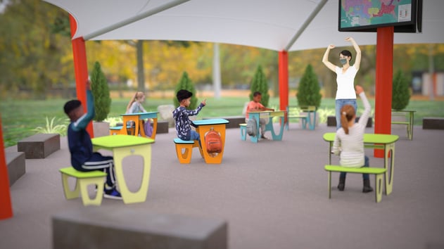 Outdoor classrooms with fabric shades provide a cool, functional space for students to learn and engage with nature.