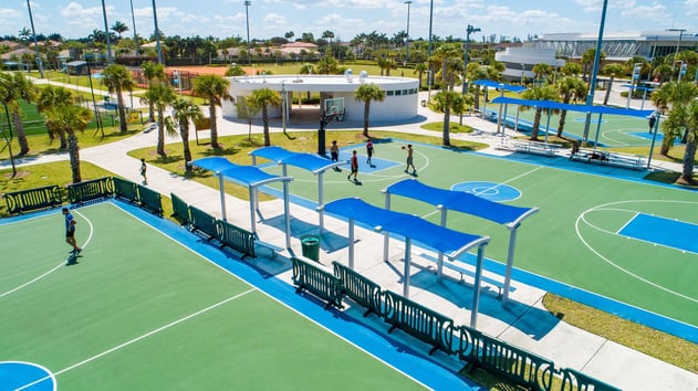 Fabric shade structures in sports complexes: Protecting spectators and equipment for sun-safe outdoor activities.