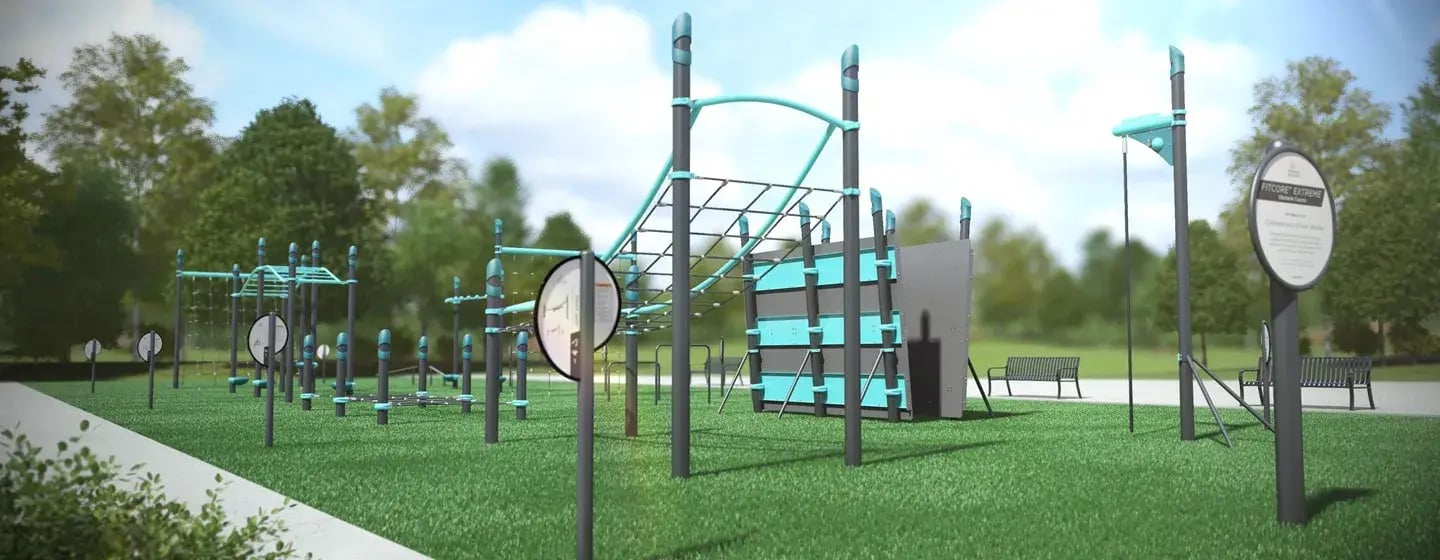 Outdoor fitness area featuring exercise stations, climbing and balance equipment with instructional signage.