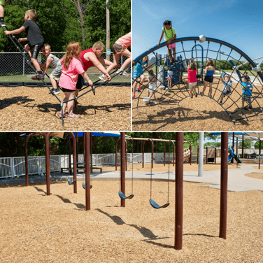 Loose-fill surfacing: A photo showing a playground area covered with loose-fill surfacing material, such as wood chips or rubber mulch, providing impact absorption and cushioning